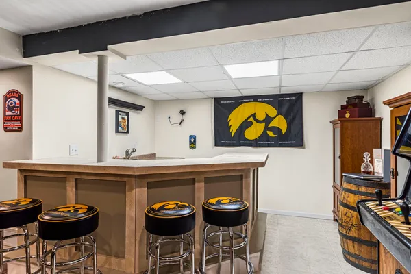 a kitchen with cabinets and window
