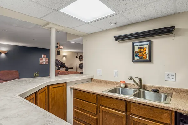 a bedroom with furniture and a window