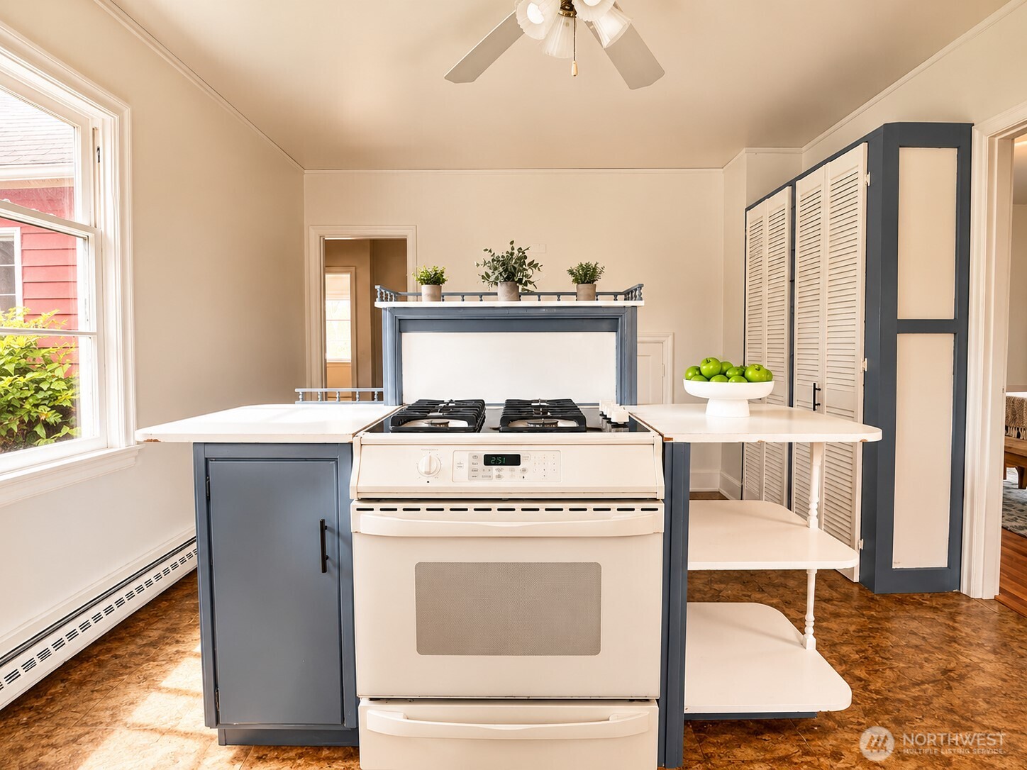 2154 Cranberry Road Grayland, WA 98547 - Photo 8 of 38 a kitchen with a stove a refrigerator and a window