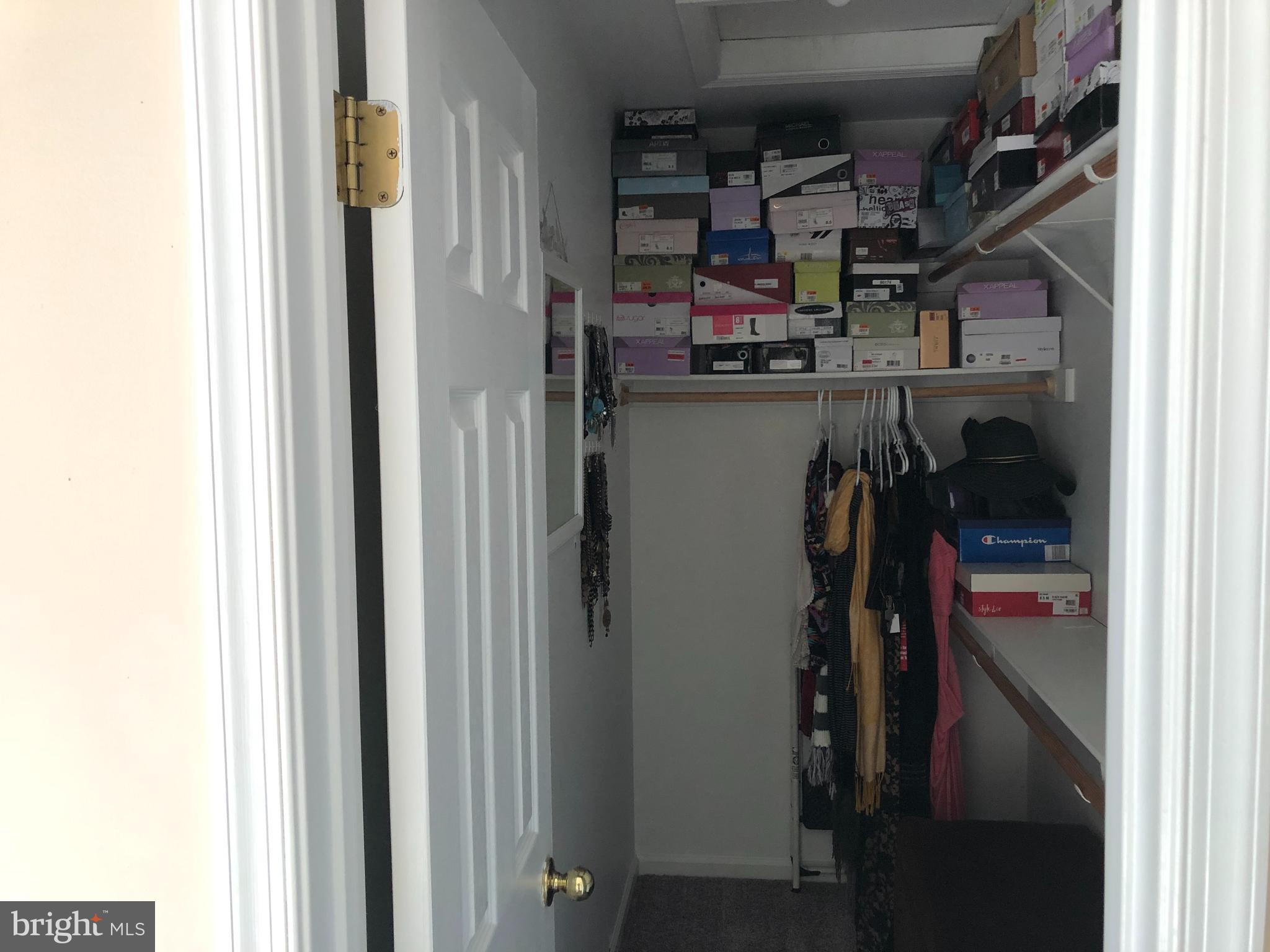 9087 Slate Stone Loop Bristow, VA 20136 - Photo 12 of 28 Master Bedroom Walk-in Closet