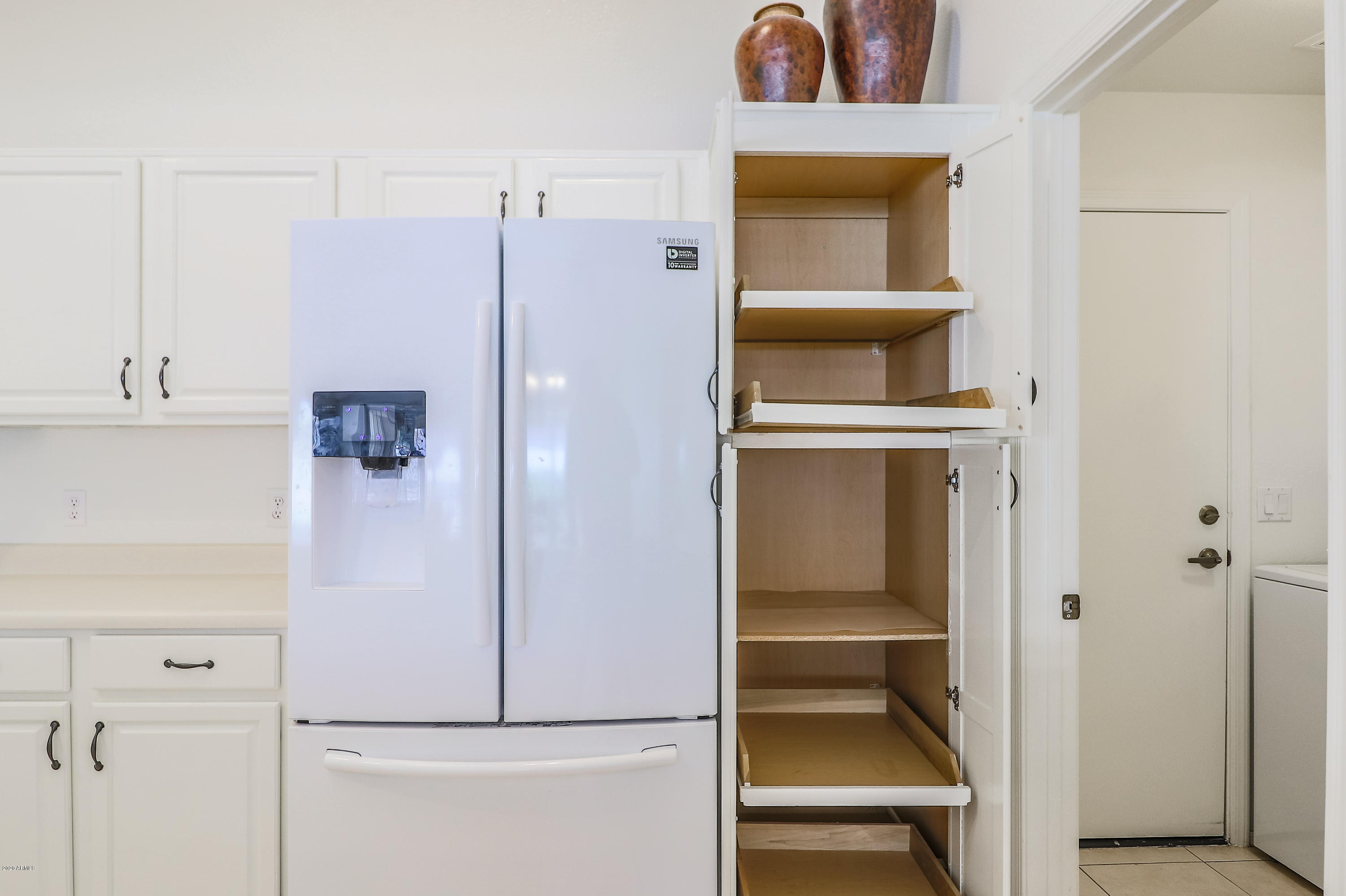 17346 North Inca Way Surprise, AZ 85374 - Photo 19 of 55 Pantry With Rollout Shelves