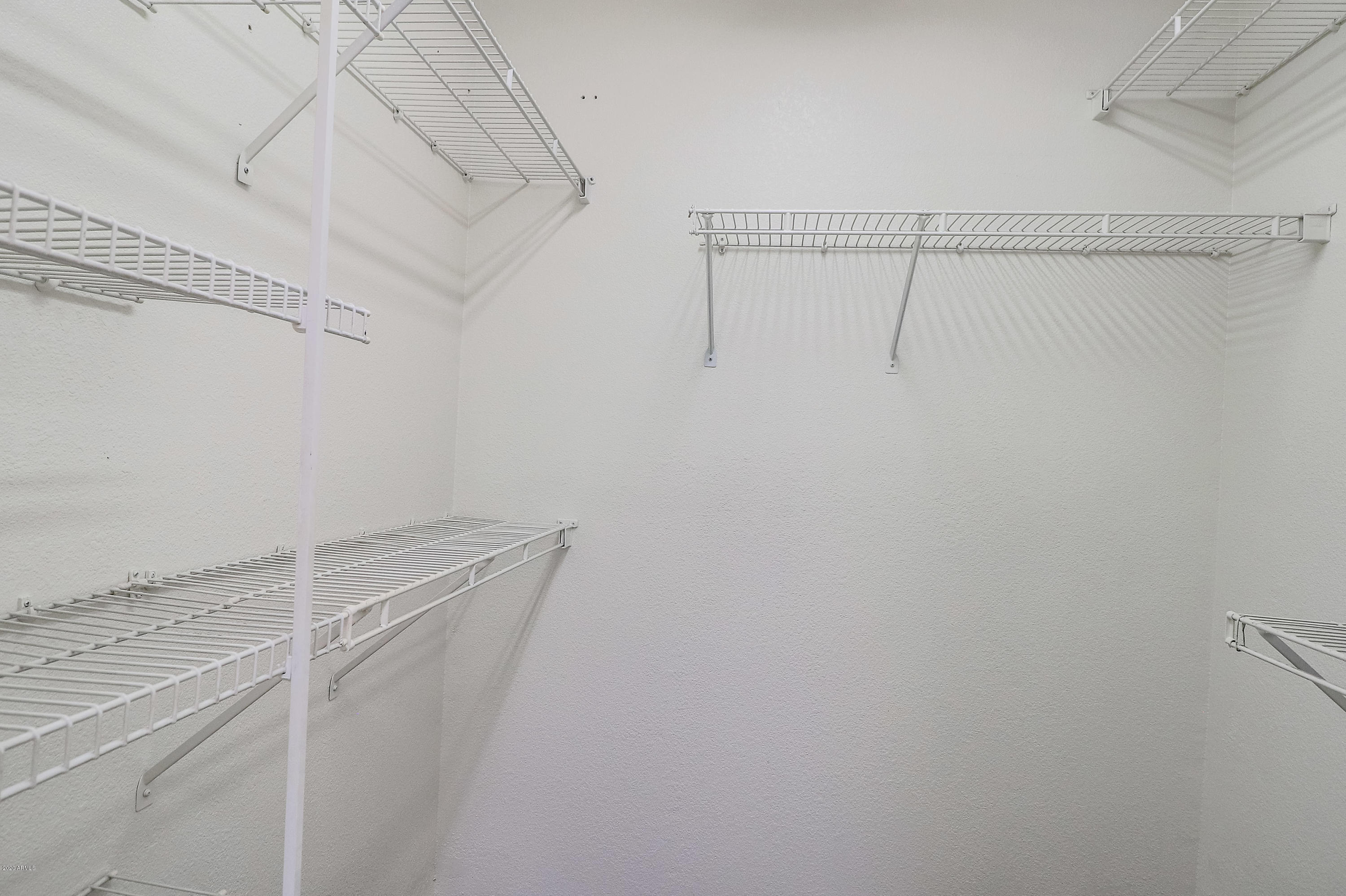 17346 North Inca Way Surprise, AZ 85374 - Photo 27 of 55 Master Bedroom Walk-in Closet
