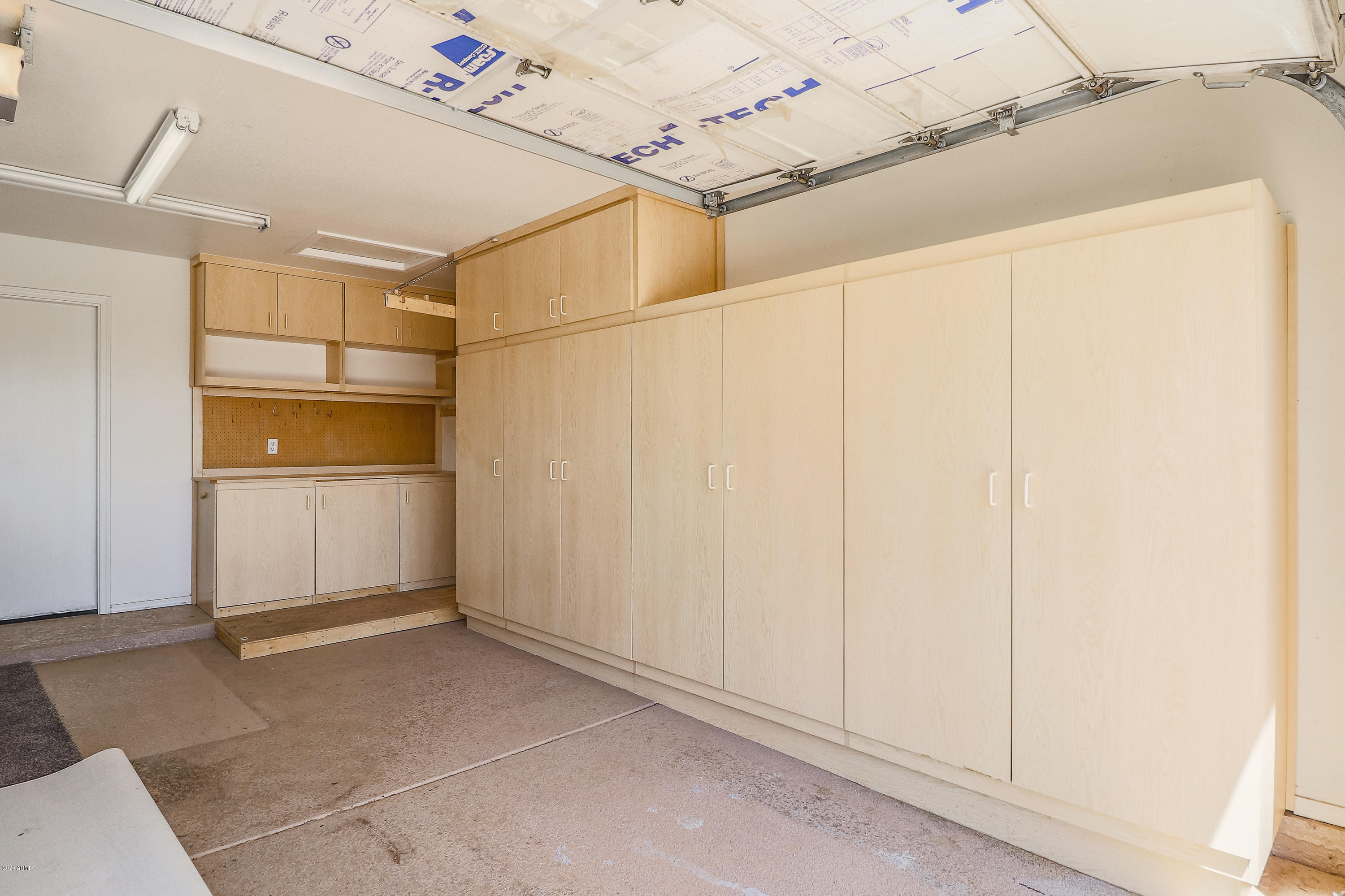 17346 North Inca Way Surprise, AZ 85374 - Photo 32 of 55 Garage With Built-In Cabinets