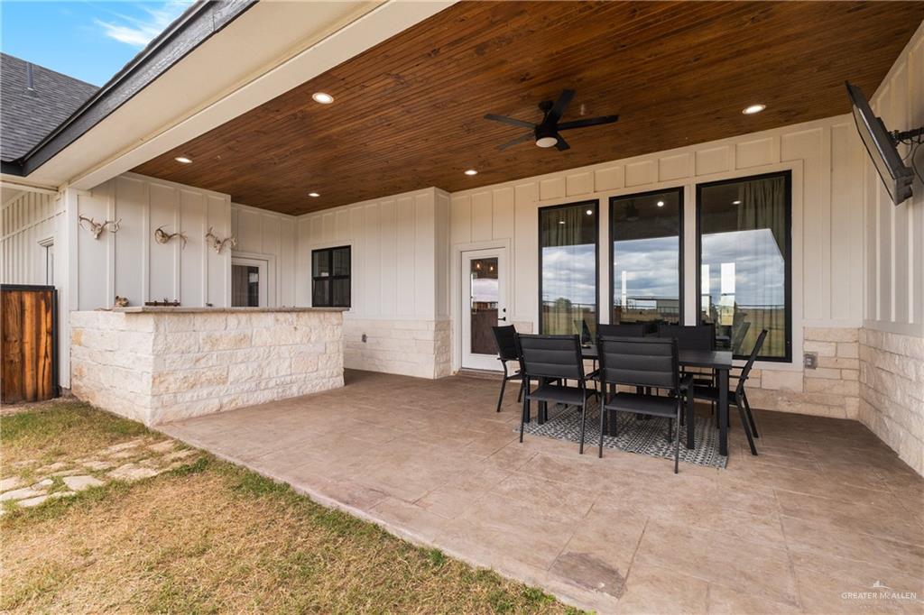 23588 Beefmaster Road Monte Alto, TX 78538 - Photo 29 of 45 a view of a dining room with furniture and window