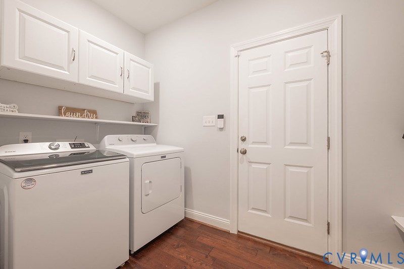 9425 Marie Road New Kent, VA 23124 - Photo 38 of 55 a view of a storage and utility room with washer and dryer