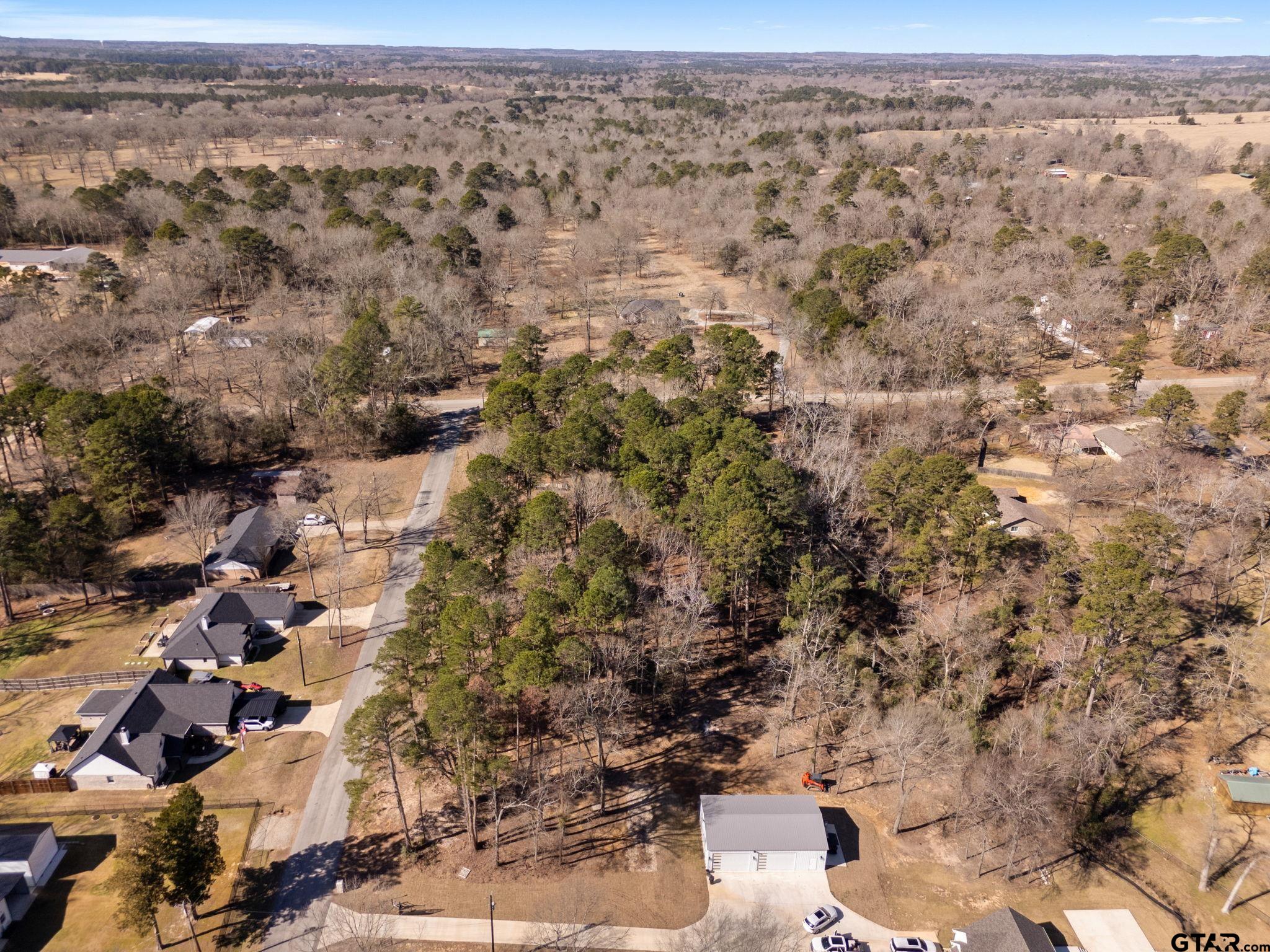Tbd Tbd Wilson Road Tyler, TX 75707 - Photo 10 of 13 an aerial view of residential houses with outdoor space