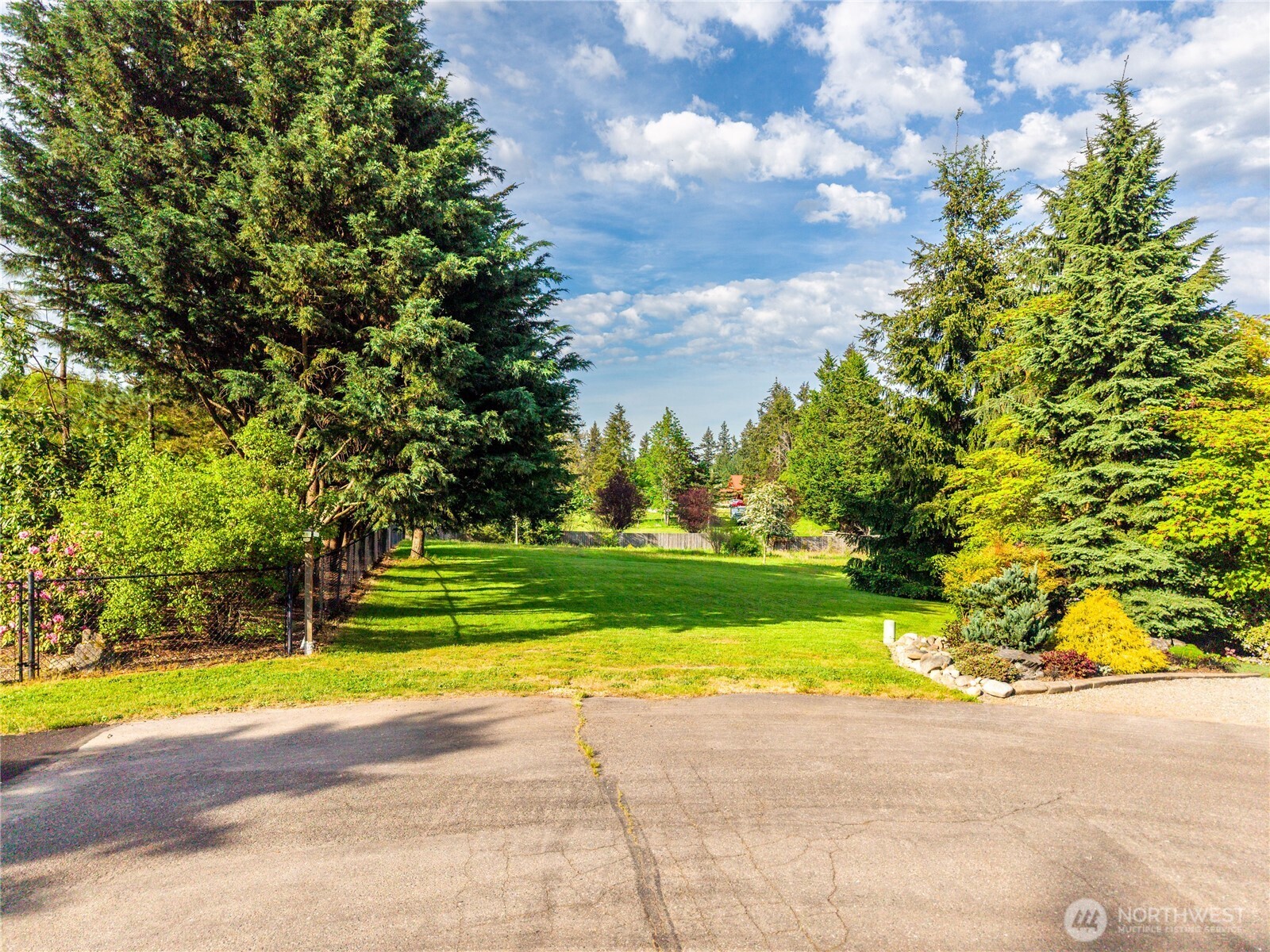 23421 Rim Road Graham, WA 98338 - Photo 12 of 21 a view of a swimming pool with an outdoor space and seating area