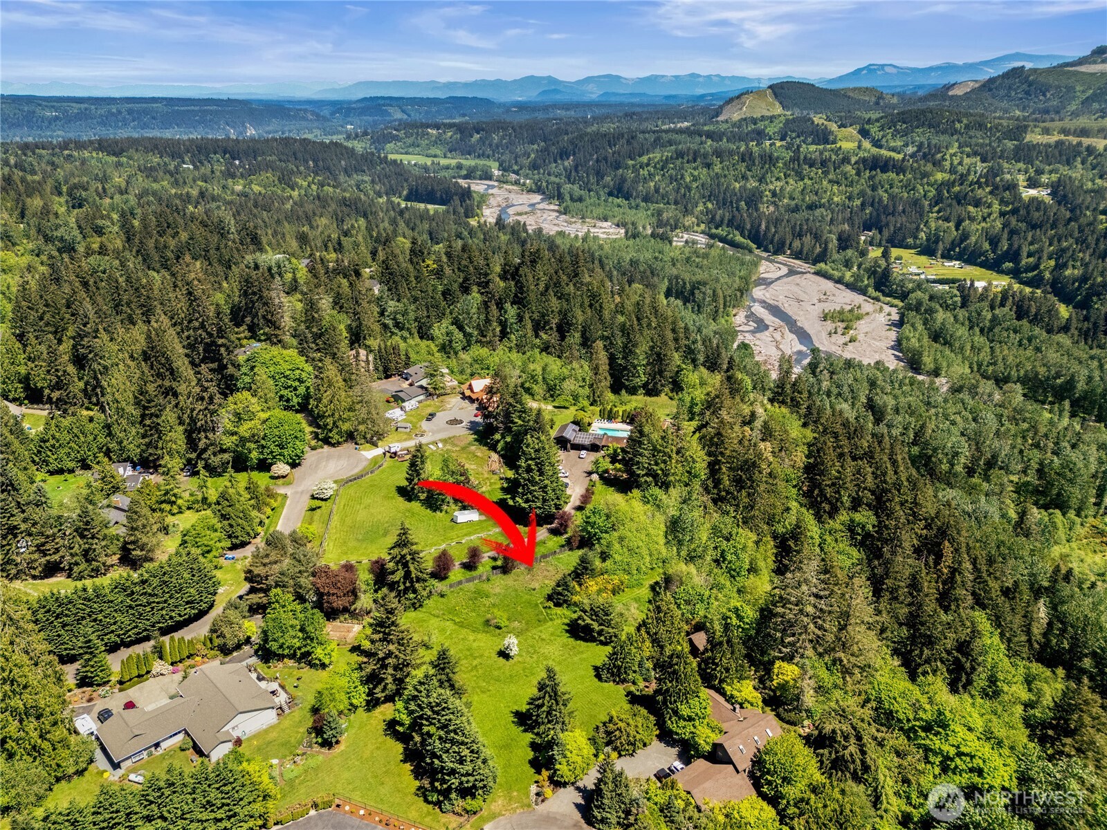 23421 Rim Road Graham, WA 98338 - Photo 4 of 21 an aerial view of residential house with outdoor space and trees all around