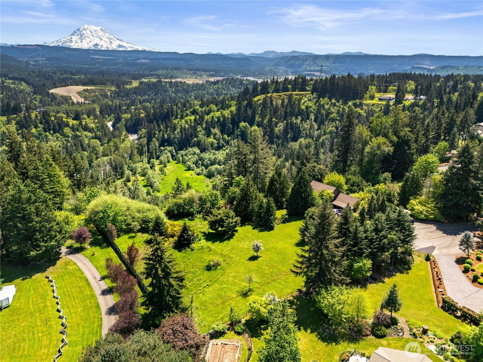 23421 Rim Road Graham, WA 98338 - Photo 10 of 21 a view of a city with mountains in the background
