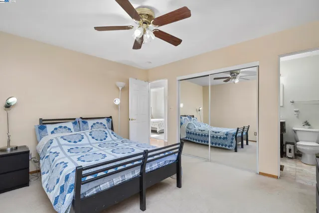a view of a patio with table and chairs and potted plants