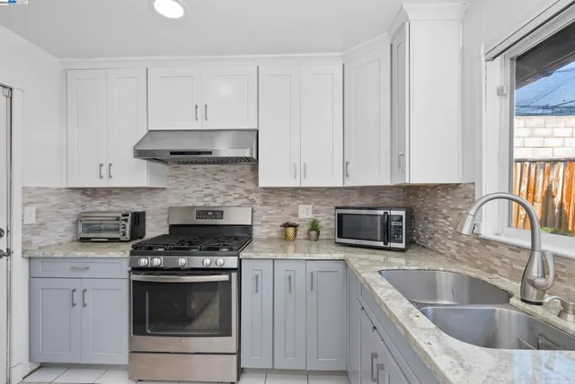 a living room with furniture and a clock