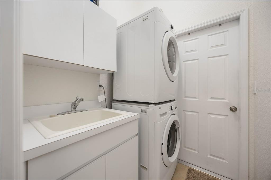 48 Bunker Road Rotonda West, FL 33947 - Photo 35 of 59 a utility room with dryer and washer