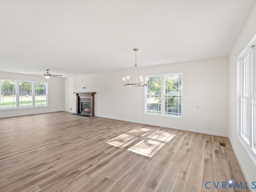 2021 Ridge Road Powhatan, VA 23139 - Photo 14 of 44 wooden floor in an empty room with a window