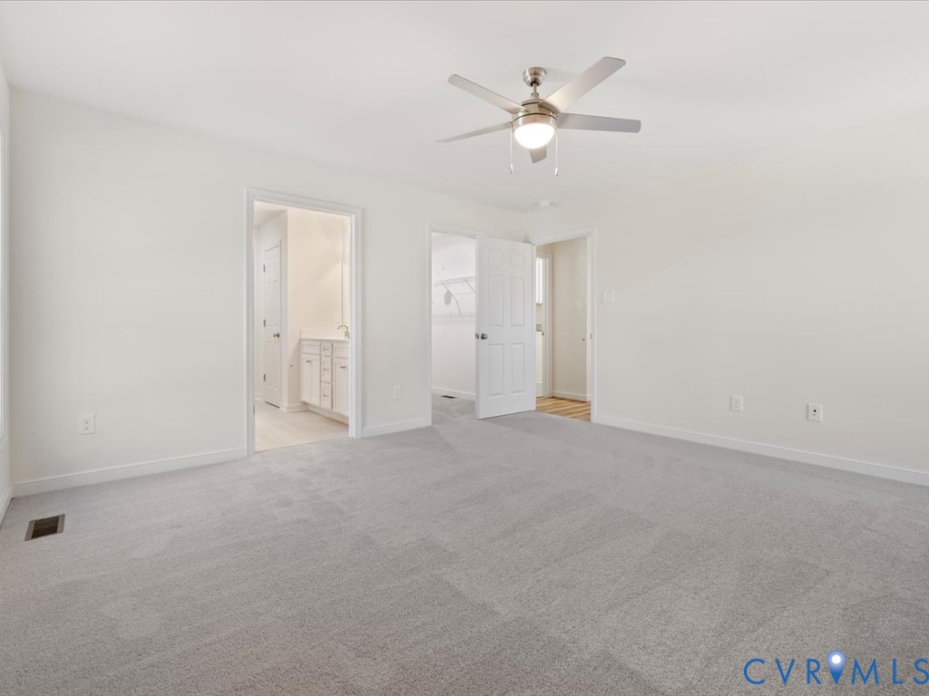2021 Ridge Road Powhatan, VA 23139 - Photo 19 of 44 an empty room with fan and window