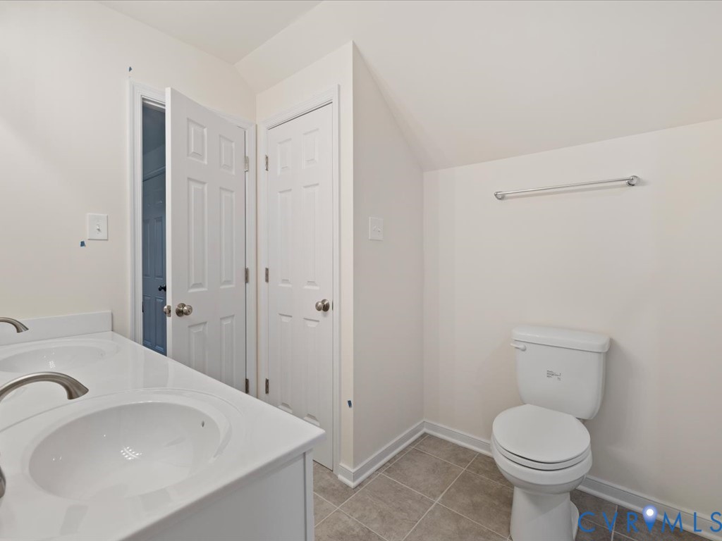 2021 Ridge Road Powhatan, VA 23139 - Photo 31 of 44 a bathroom with a sink toilet and a tub