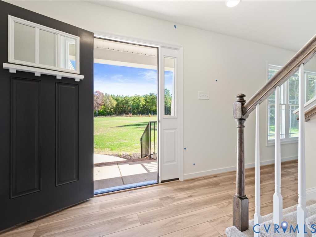 2021 Ridge Road Powhatan, VA 23139 - Photo 6 of 44 a view of a room with wooden floor and windows