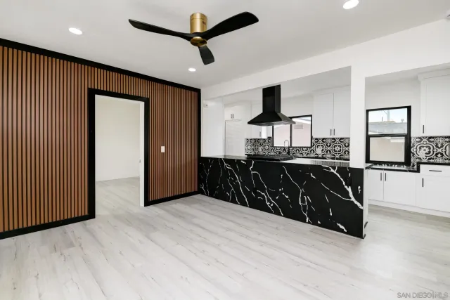 a bed room with a bed and a window