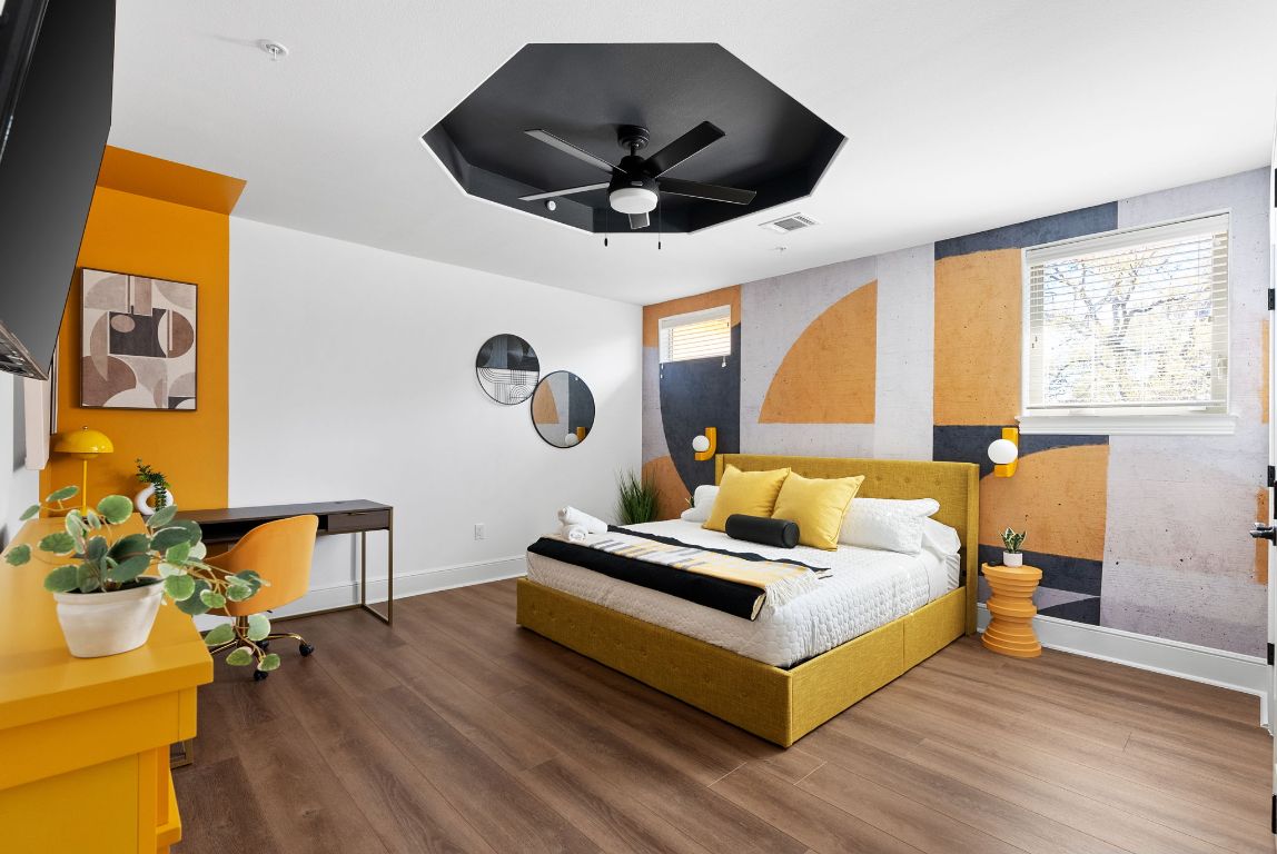 1116 Terjo Lane Austin, TX 78732 - Photo 17 of 40 a living room with a bed furniture and a large window