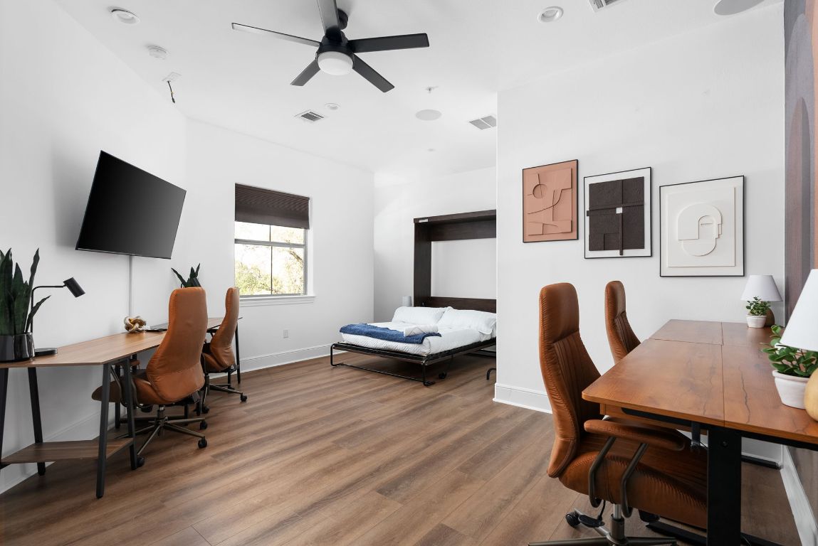 1116 Terjo Lane Austin, TX 78732 - Photo 25 of 40 a living room with furniture and a flat screen tv