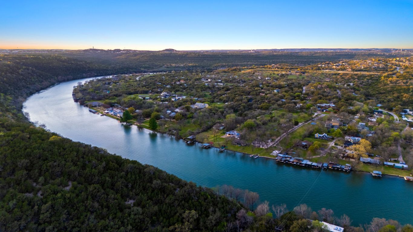 1116 Terjo Lane Austin, TX 78732 - Photo 3 of 40 an aerial view of residential houses with outdoor space and river