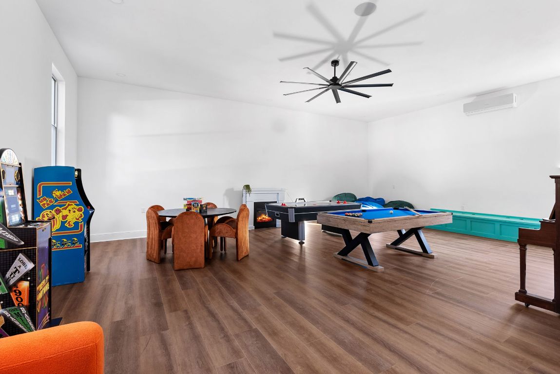 1116 Terjo Lane Austin, TX 78732 - Photo 31 of 40 a living room with furniture and wooden floor