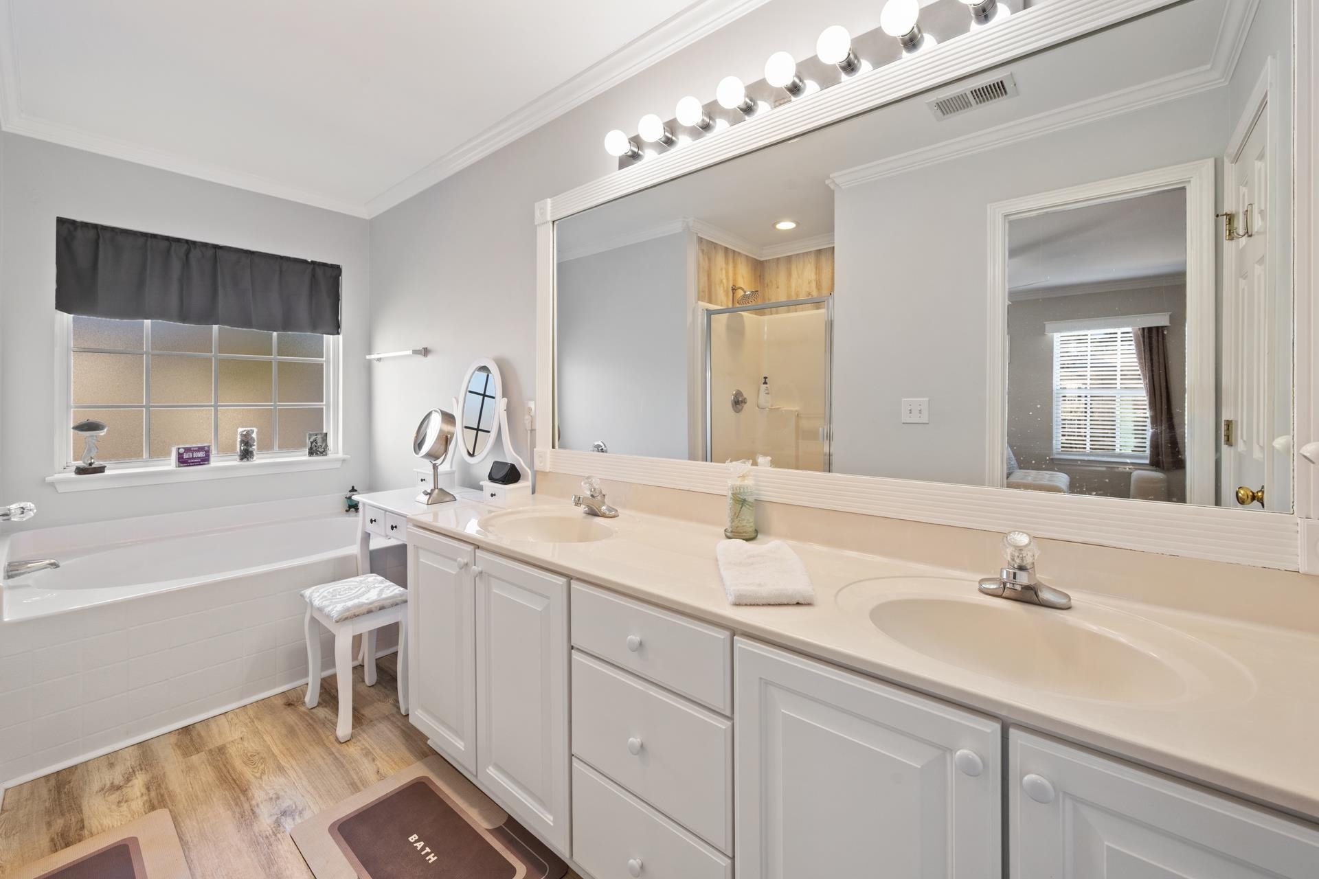 4665 Fringetree Drive, Unit 5E Murrells Inlet, SC 29576 - Photo 13 of 22 Featuring Double Vanities, Shower, and Garden Tub