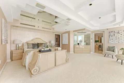 a view of a kitchen with furniture and chandelier