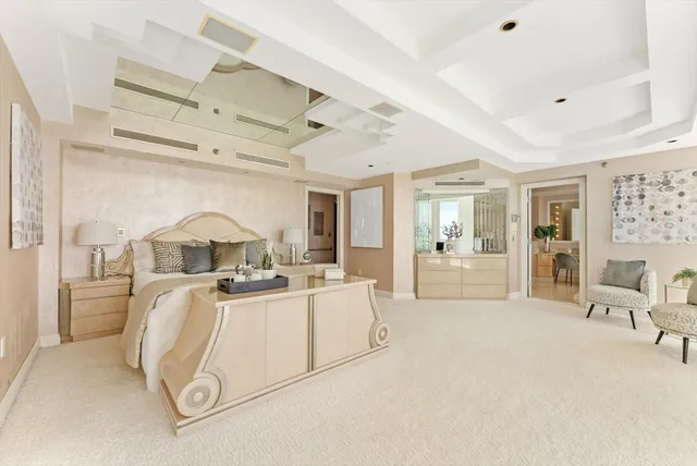 a view of a kitchen with furniture and chandelier