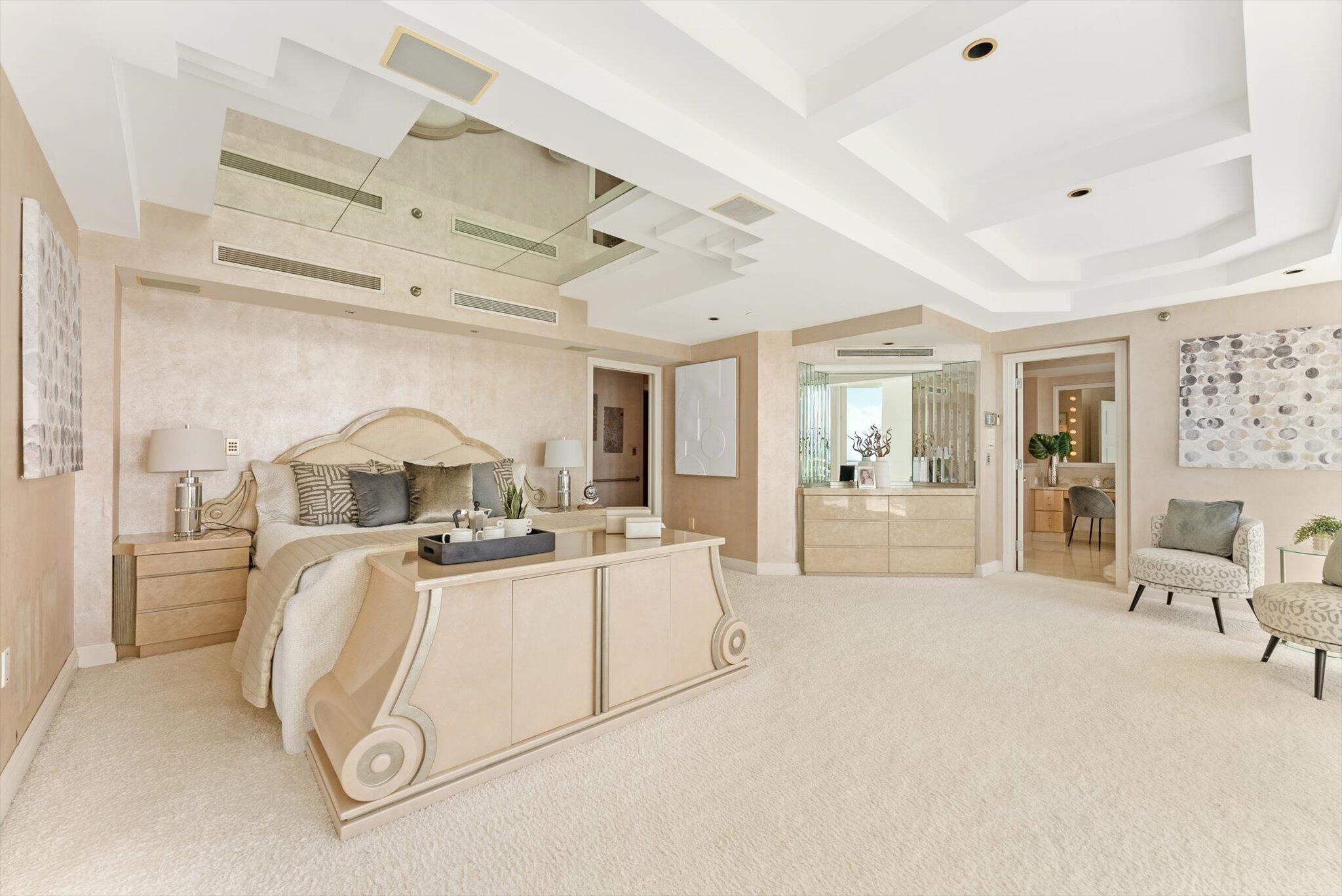 800 South Ocean Boulevard, Unit 303 Boca Raton, FL 33432 - Photo 21 of 49 a view of a kitchen with furniture and chandelier