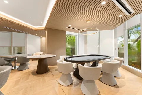 a kitchen with a table and chairs