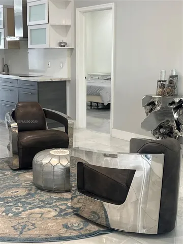 a bedroom with a bed and glass window