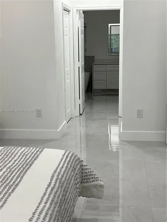 a bathroom with a sink and a shower