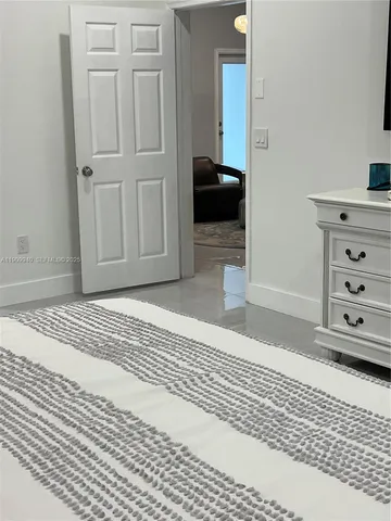 a view of swimming pool with seating area