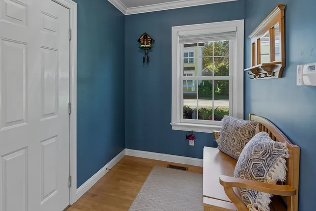 a spacious bedroom with a bed and window