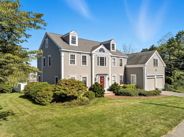 an aerial view of swimming pool a fireplace and chandelier