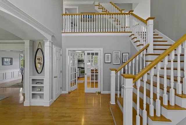 a bathroom with a granite countertop sink mirror and shower