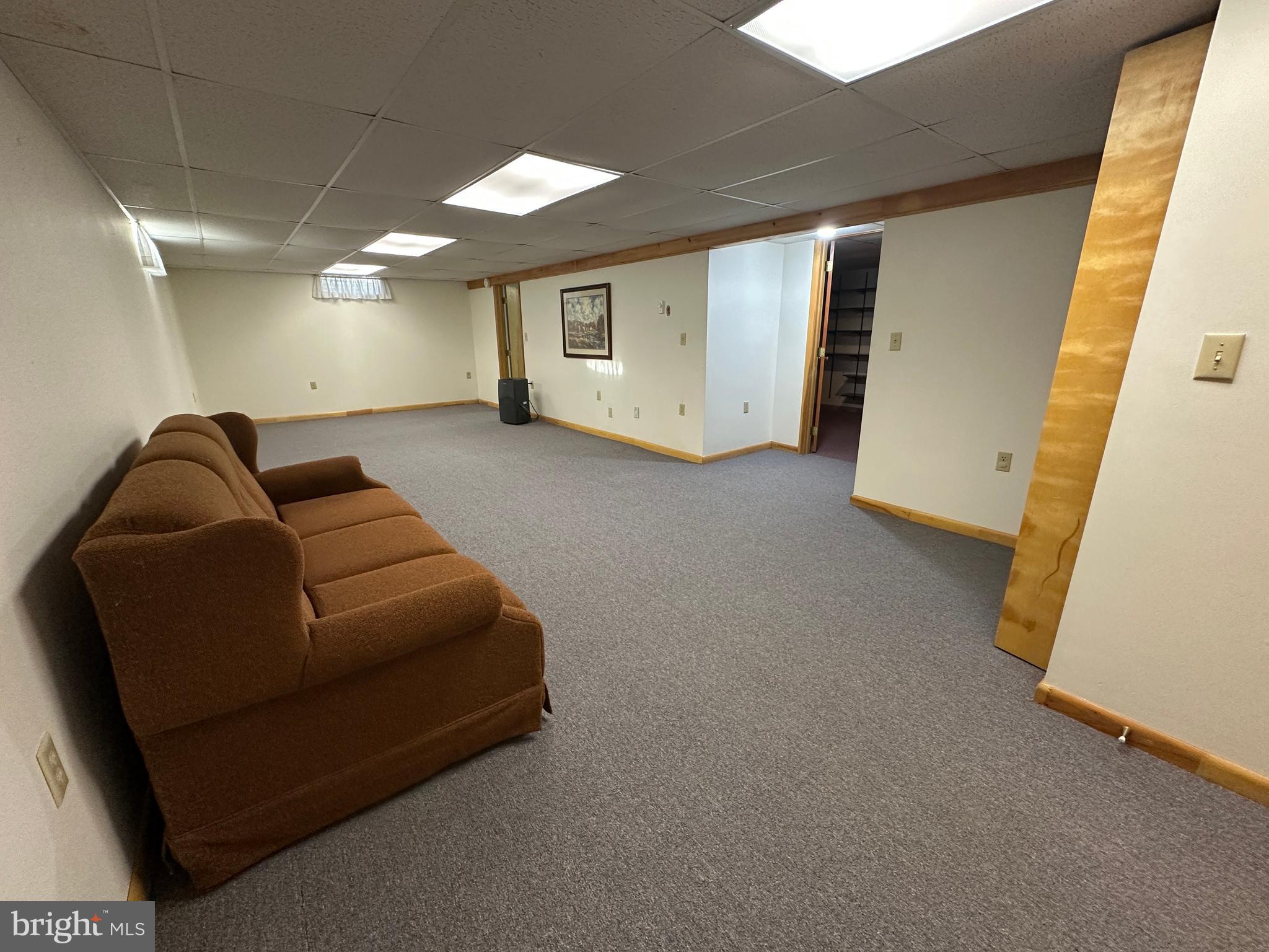 236 Bullshead Road Newville, PA 17241 - Photo 112 of 140 a living room with furniture and a rug