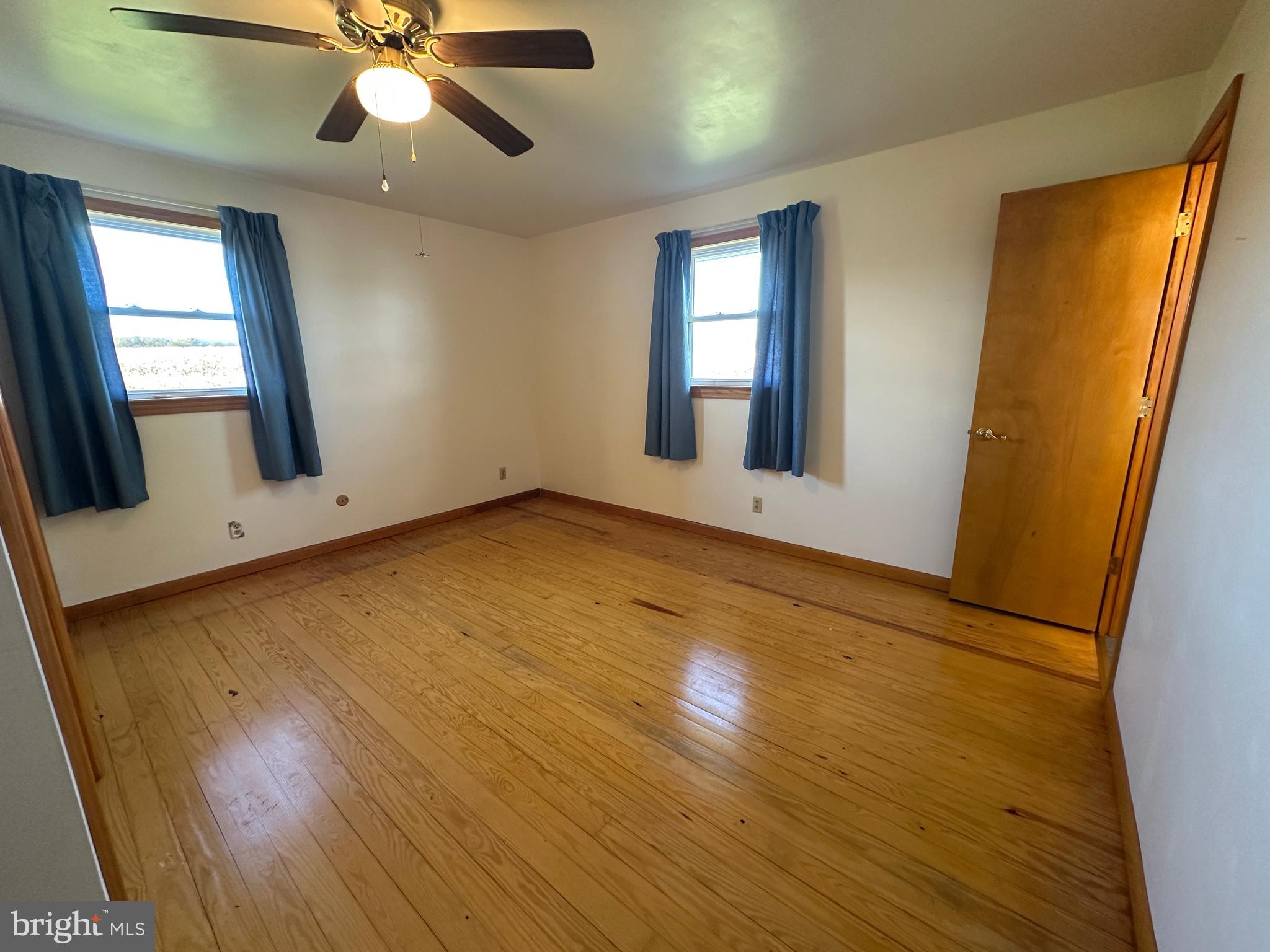 236 Bullshead Road Newville, PA 17241 - Photo 78 of 140 a view of an empty room with window and wooden floor