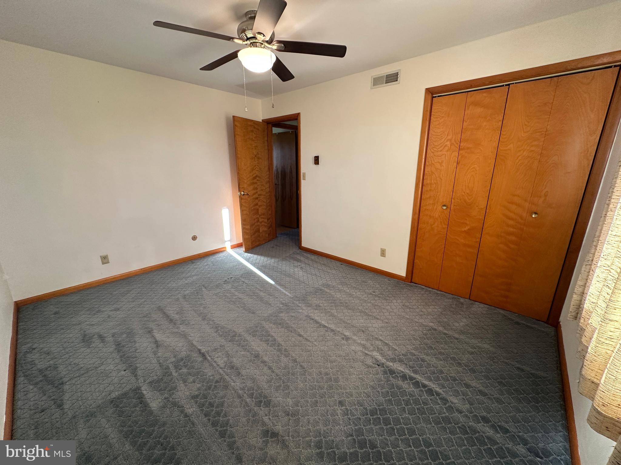 236 Bullshead Road Newville, PA 17241 - Photo 87 of 140 an empty room with closet and a ceiling fan