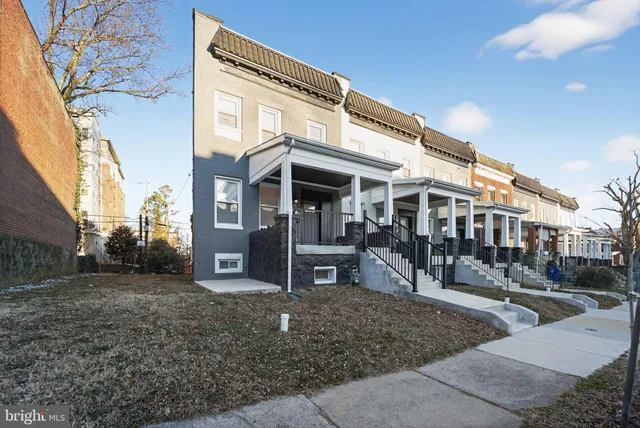 a view of a building with a street