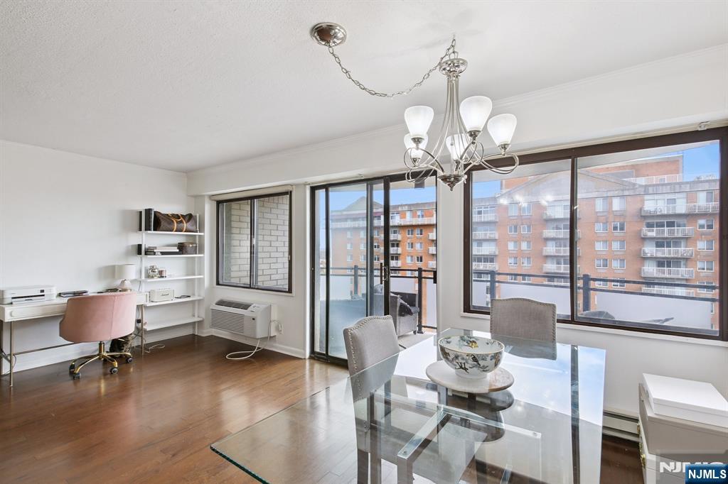 125 Prospect Avenue, Unit 17G Hackensack, NJ 07601 - Photo 4 of 20 a view of a livingroom with furniture window and outside view