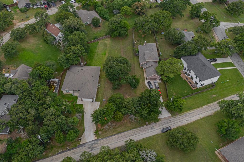 563 Valley Drive Oak Point, TX 75068 - Photo 4 of 5 an aerial view of a house with outdoor space and street view