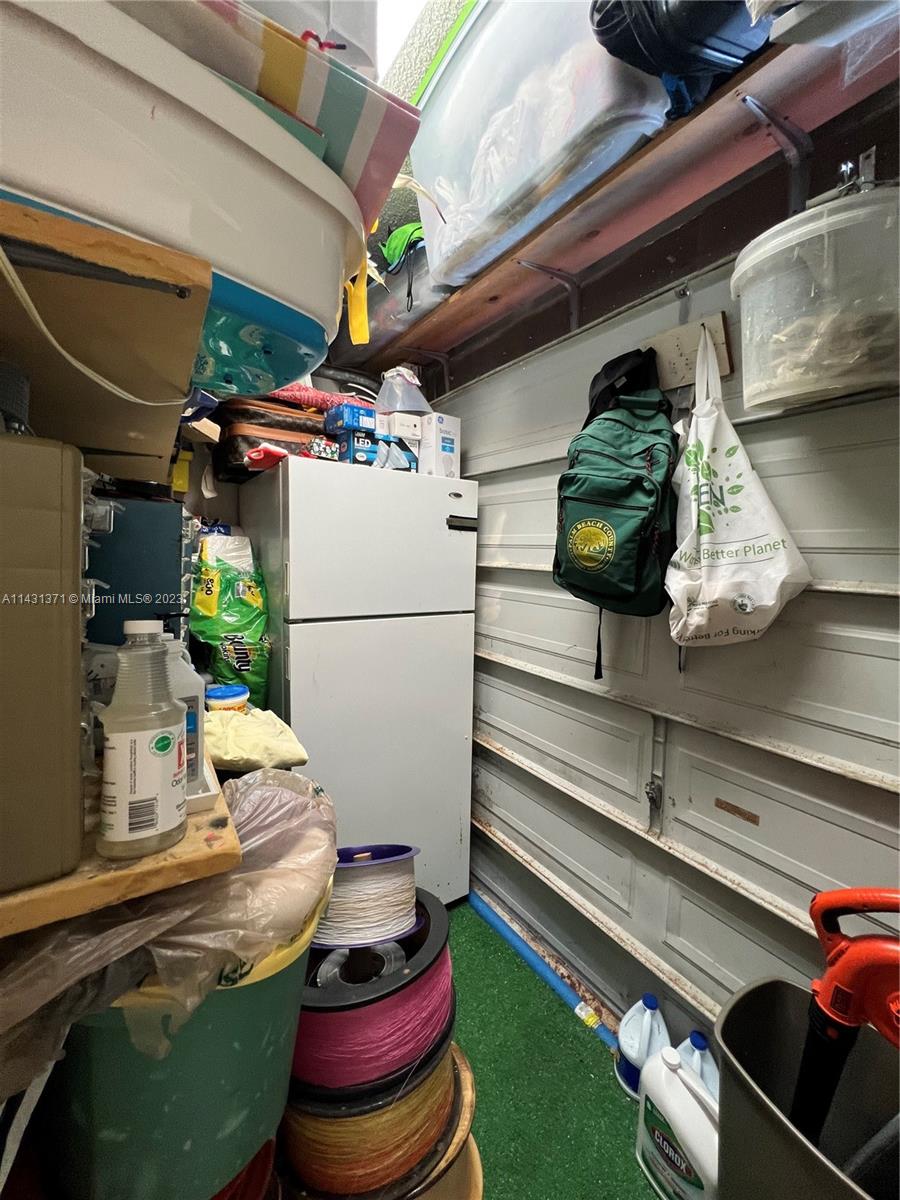 23314 Southwest 54th Way, Unit E Boca Raton, FL 33433 - Photo 29 of 69 a kitchen with a refrigerator and a stove