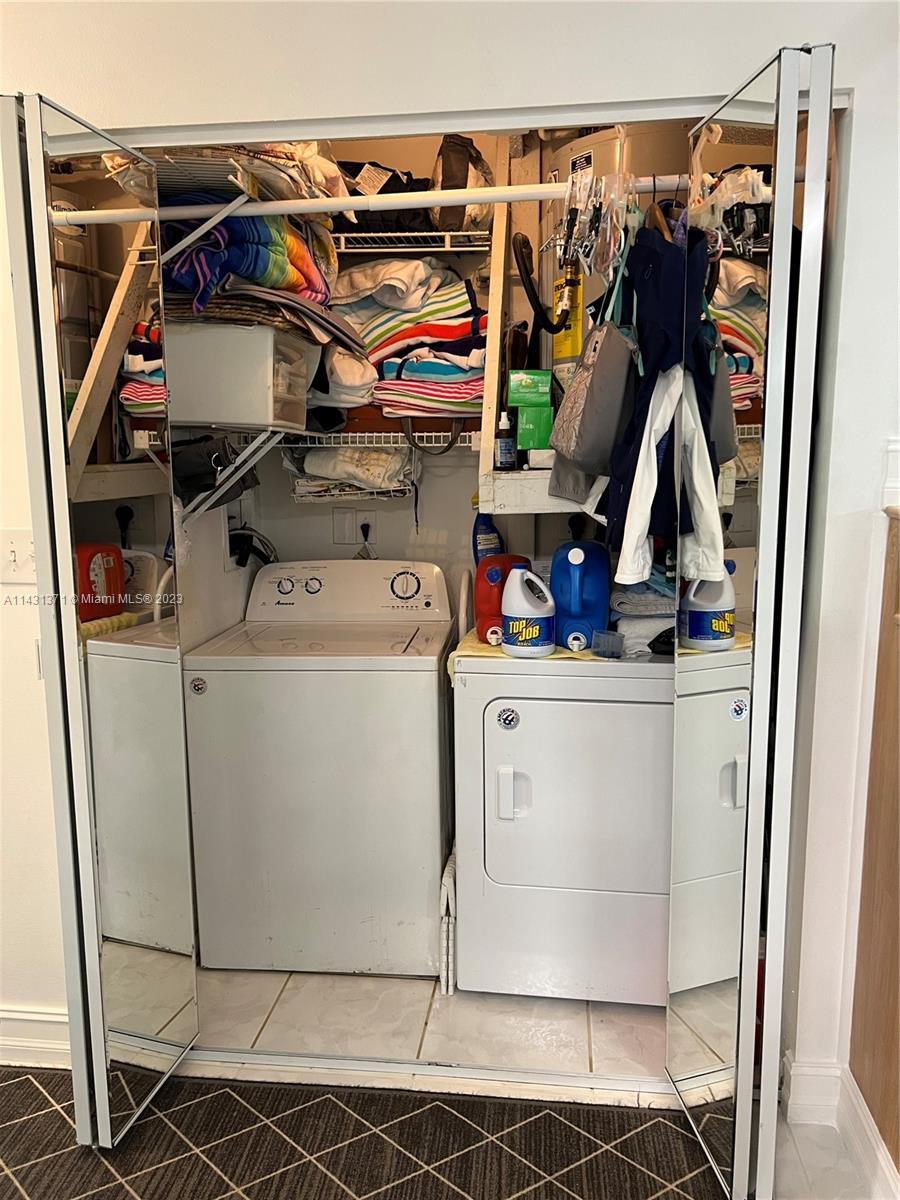 23314 Southwest 54th Way, Unit E Boca Raton, FL 33433 - Photo 35 of 69 a utility room with dryer and washer
