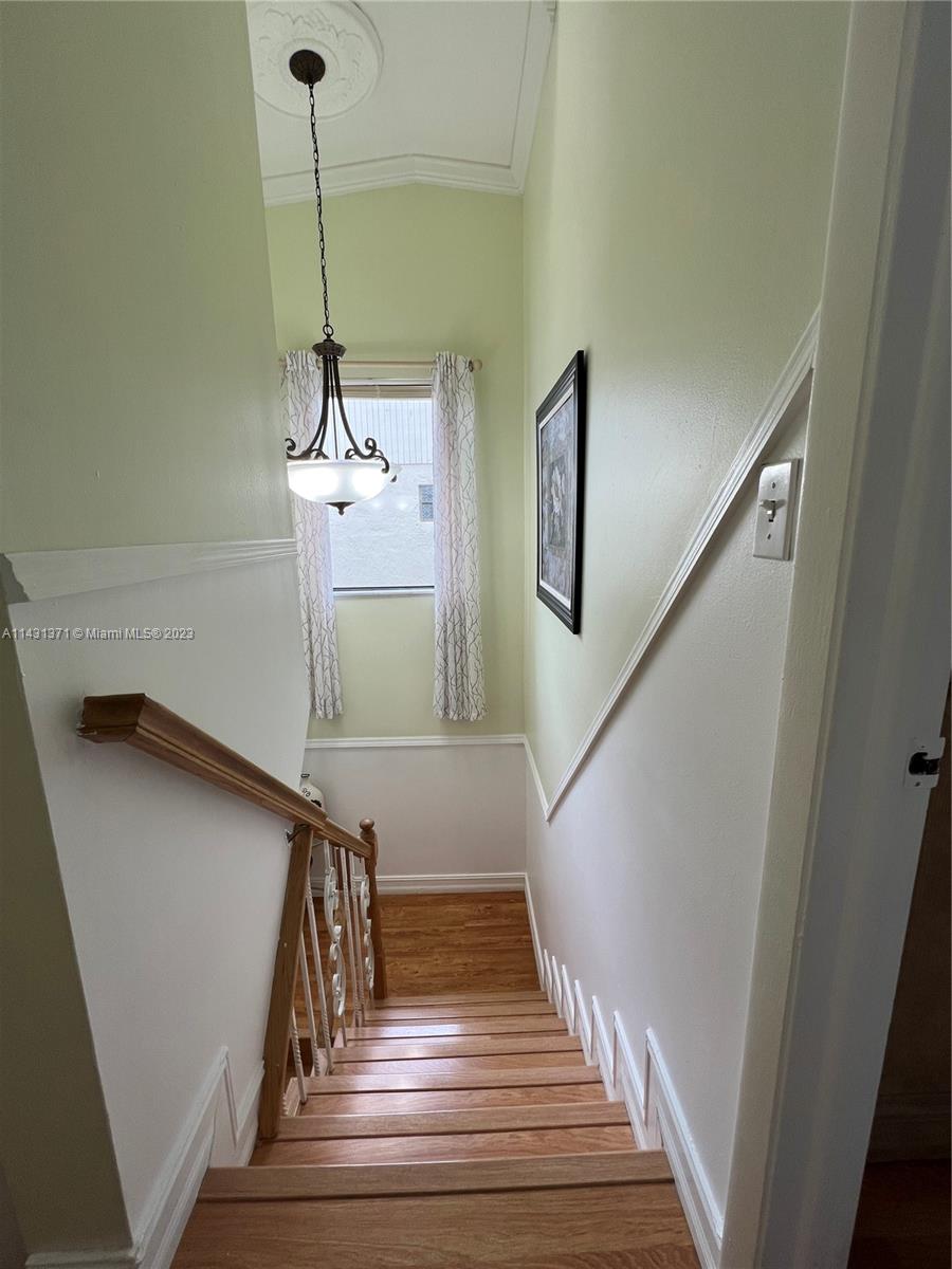 23314 Southwest 54th Way, Unit E Boca Raton, FL 33433 - Photo 52 of 69 a view of entryway and hall with wooden floor