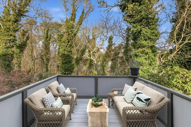 a view of an ocean beach and mountain