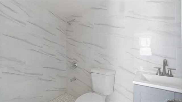 a bathroom with a sink and a toilet