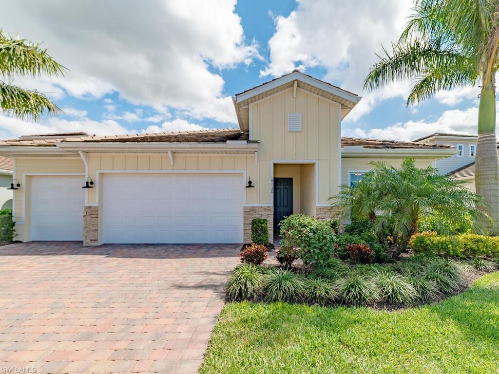 14730 Nautilus Place Naples, FL 34114 - Photo 1 of 1 a view of a house with a yard