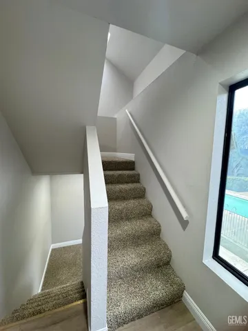 a view of staircase with white walls and white walls