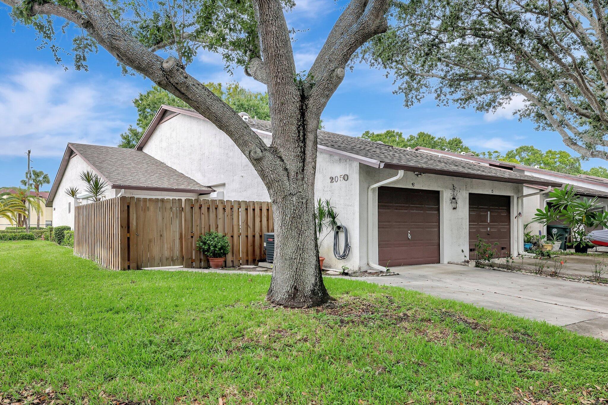 2050 Colonial Road, Unit 6 Fort Pierce, FL 34950 - Photo 2 of 21 garage corner